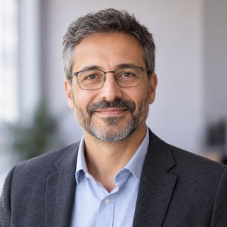AI-generated portrait for the anonymized IT Director profile